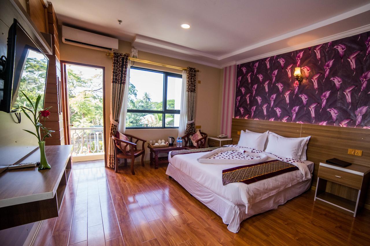Win Unity Hotel Mandalay Extérieur photo